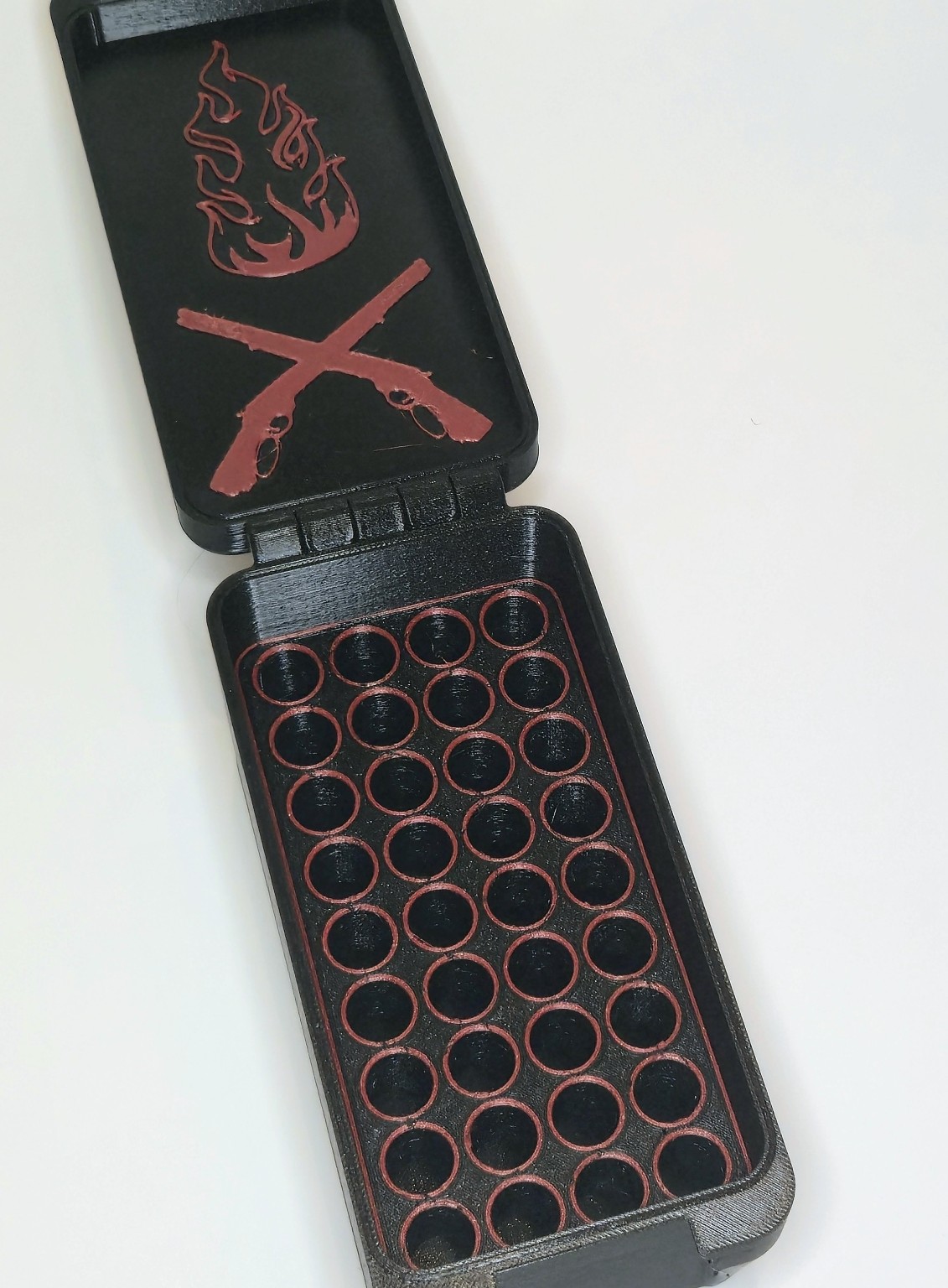 Open custom .410 gift box with crossed rifle interior art and red-accented insert