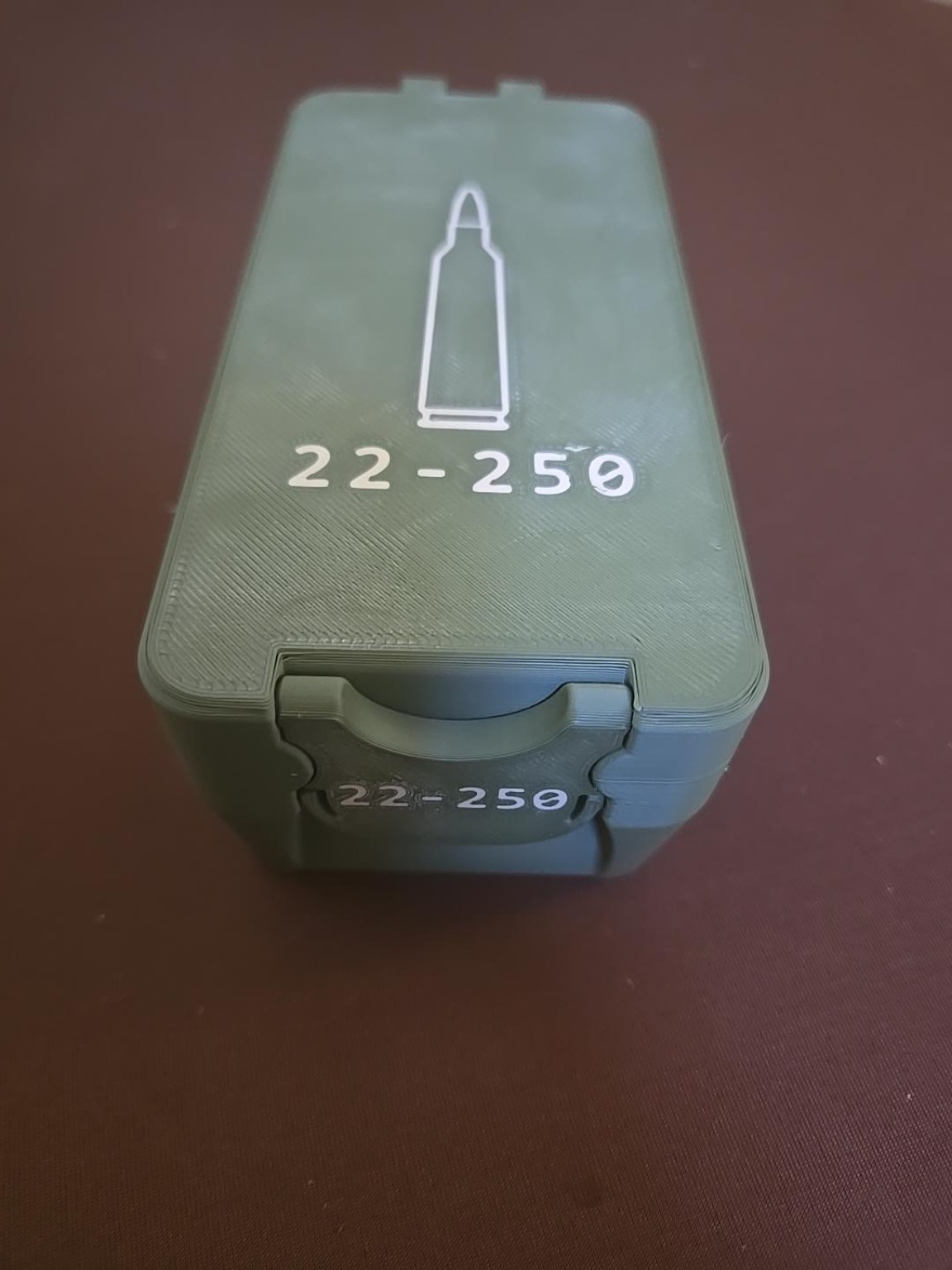 OD green BRT 22-250 Remington ammunition box with light caliber markings
